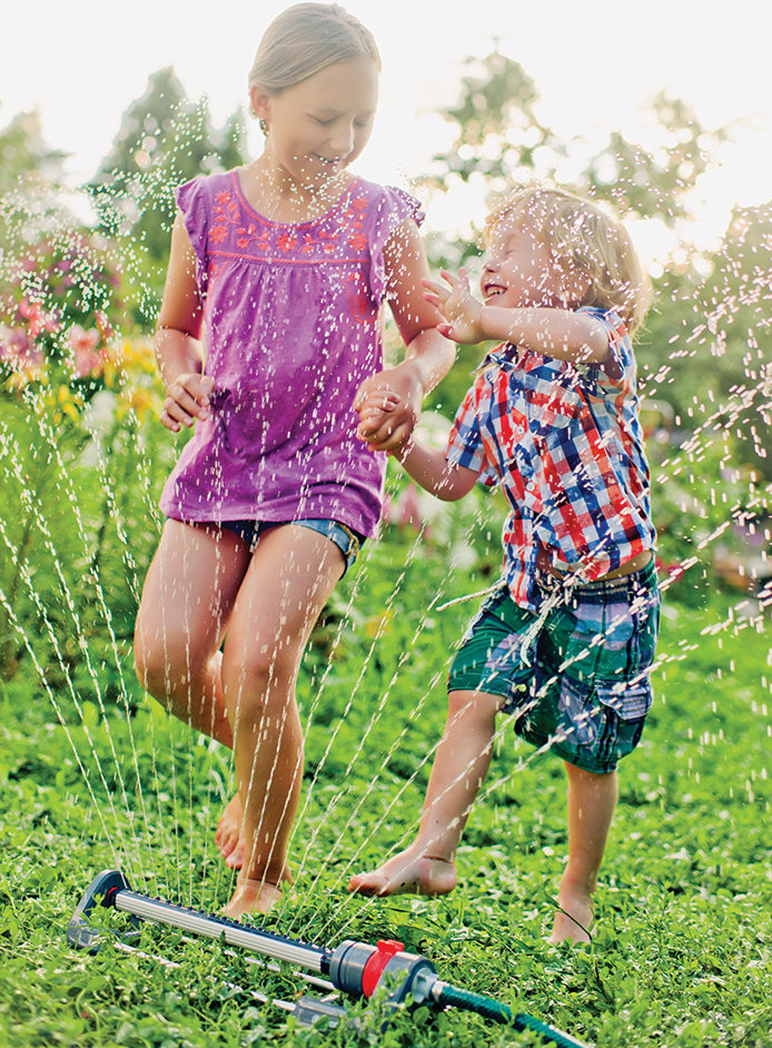 694x942-kidsplayingwatersprinkler.jpg?Revision=6Sj1&Timestamp=t9rZFx
