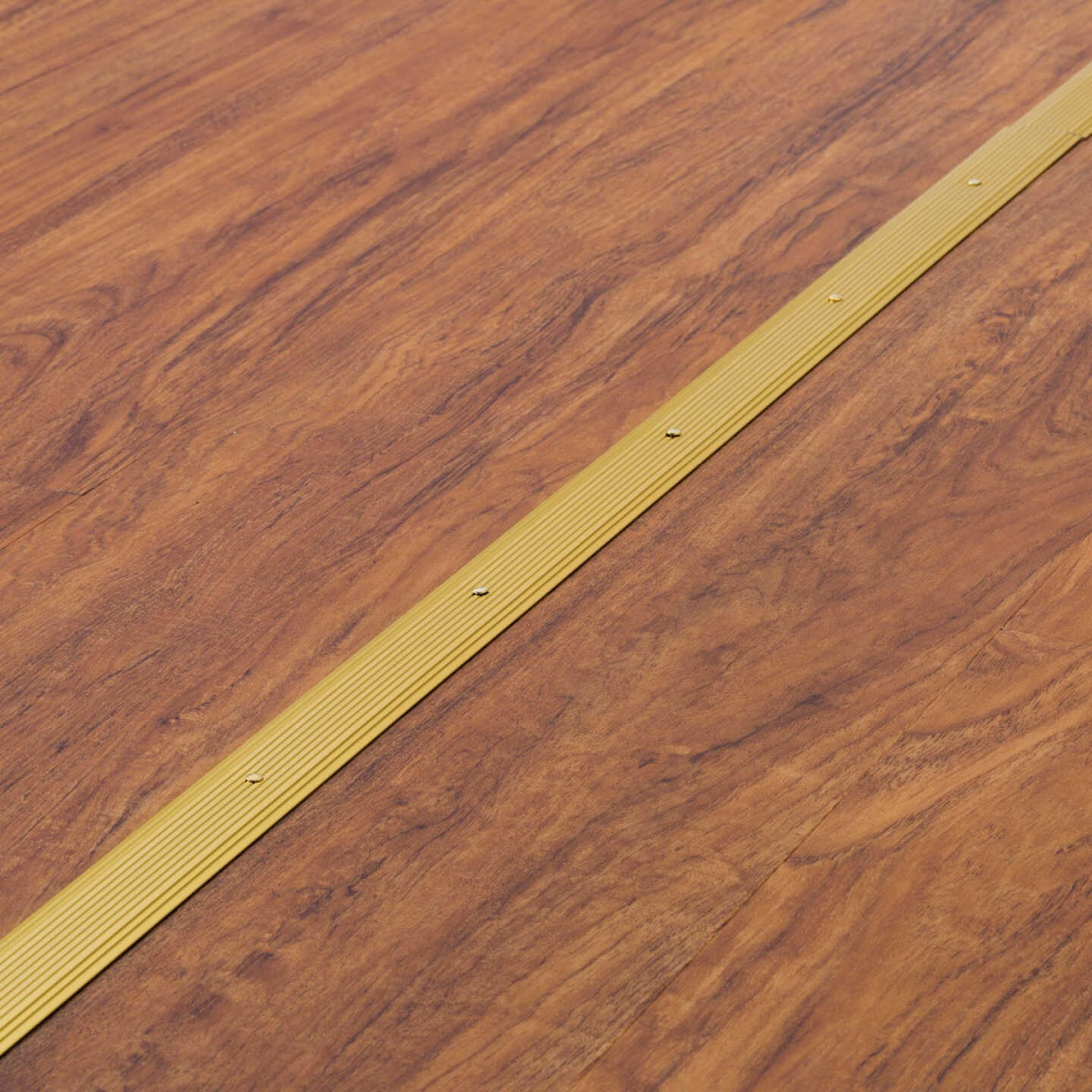 M-D Building Products 1-1/4 In. x 36 In. Satin Brass Aluminum Seam Binder with Screw Nails Image 4