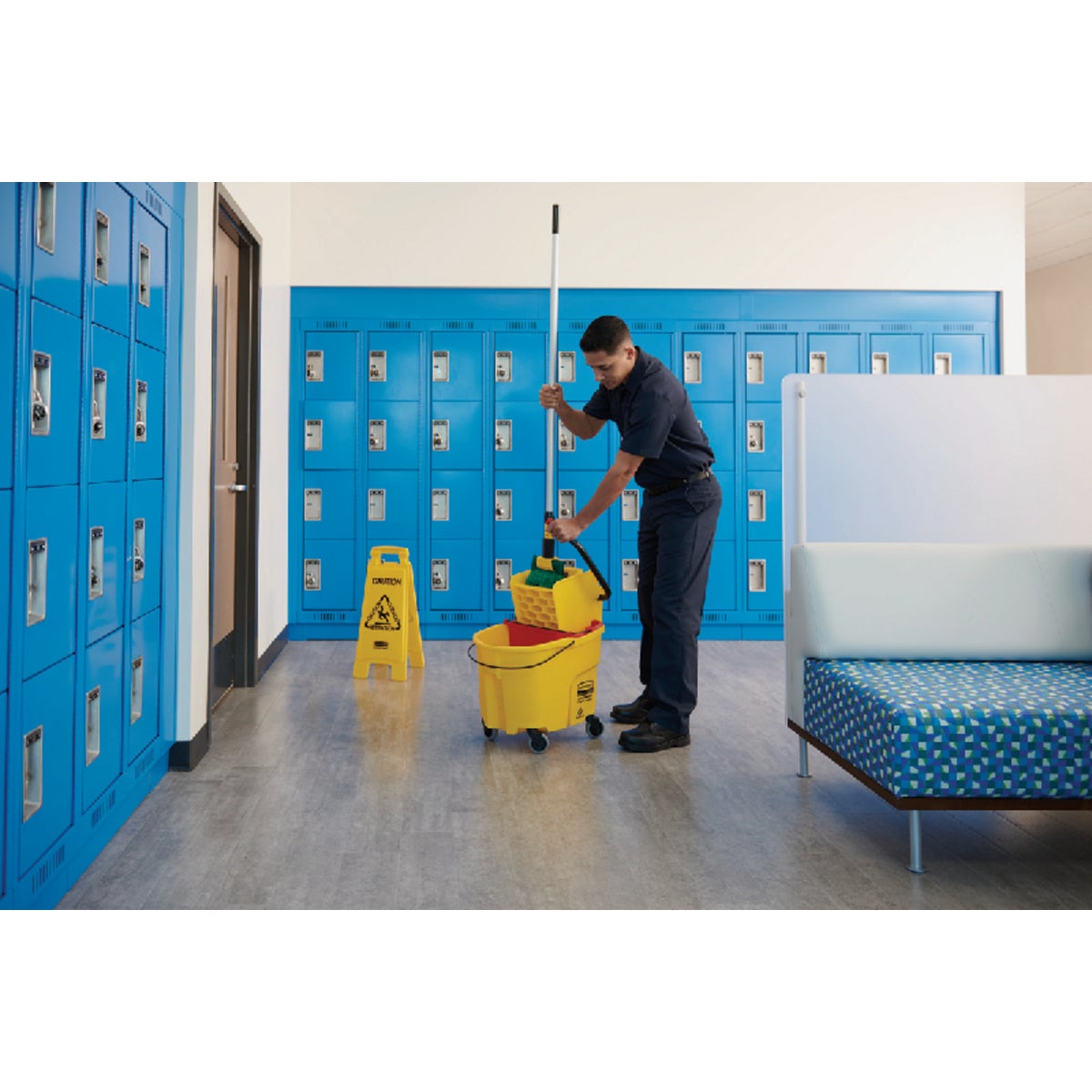 Rubbermaid Commercial 26 In. 2-Sided Yellow Multilingual Caution Sign Image 2